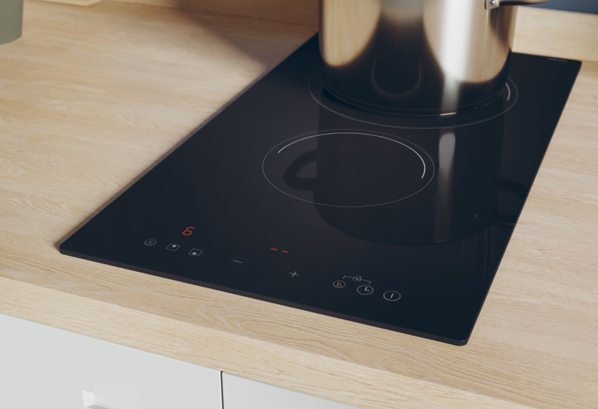 Απεικονίζονται από κοντινή λήψη οι διακόπτες αφής της εστίας.